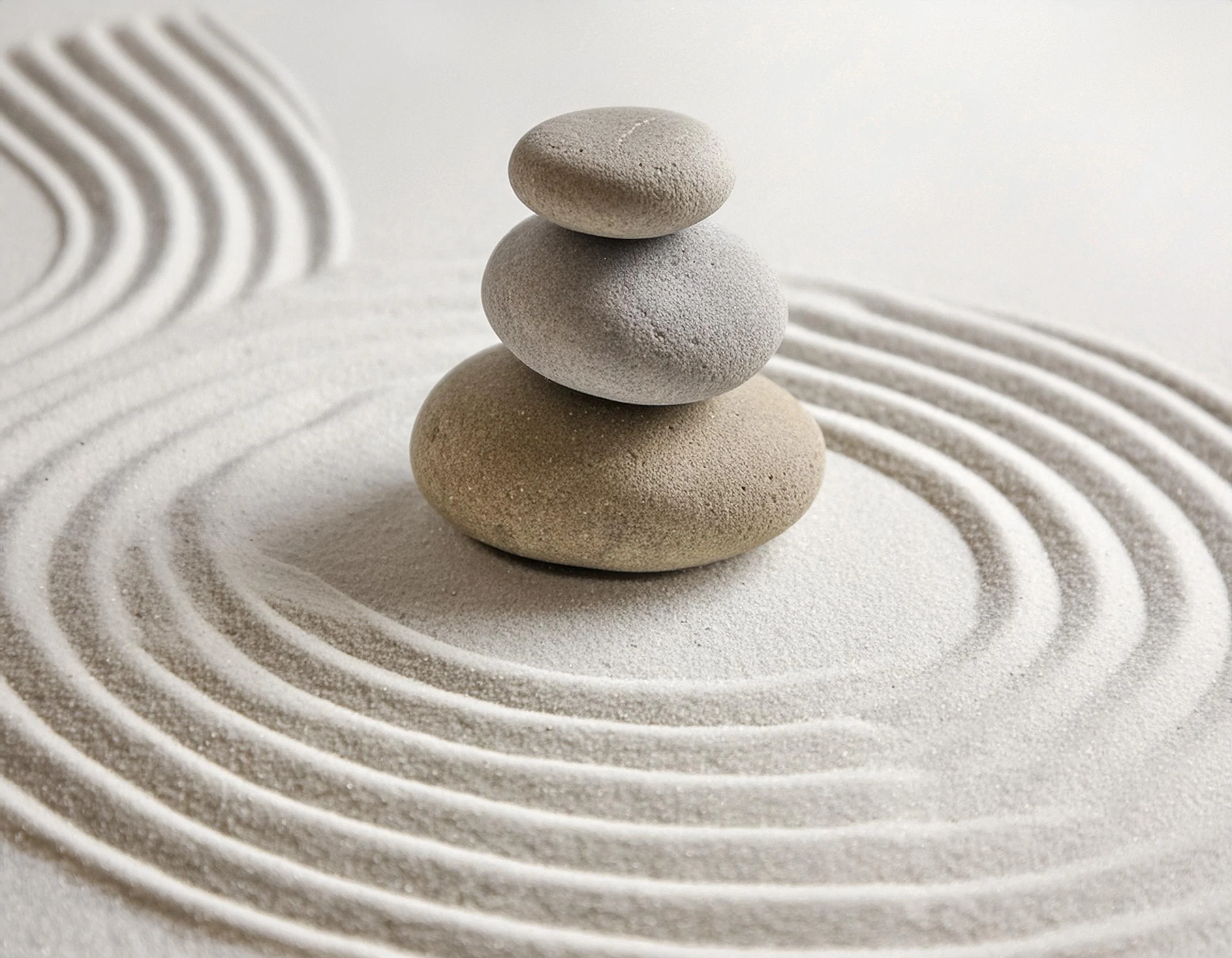 Narcissistic Abuse bg - Stacked rocks in ringed sand